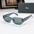Dior sunglasses with blue frames and greenish gradient lenses