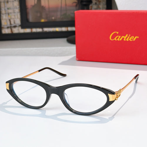Cartier eyeglasses, black frames, clear lenses, gold temple tips