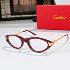 Cartier eyeglasses, burgundy frames, clear lenses, gold temple detail