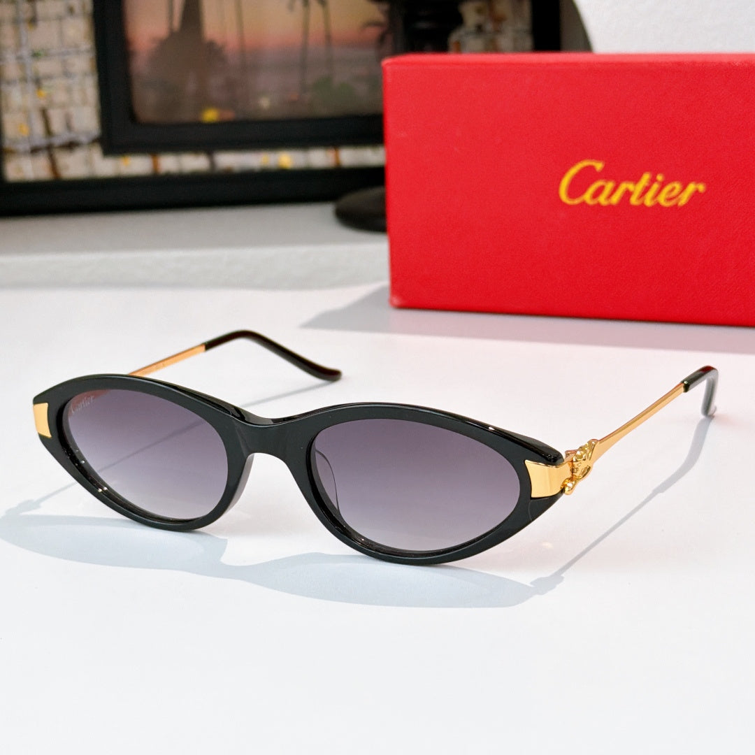 Cartier sunglasses, black frames, dark tinted lenses, gold temple detail