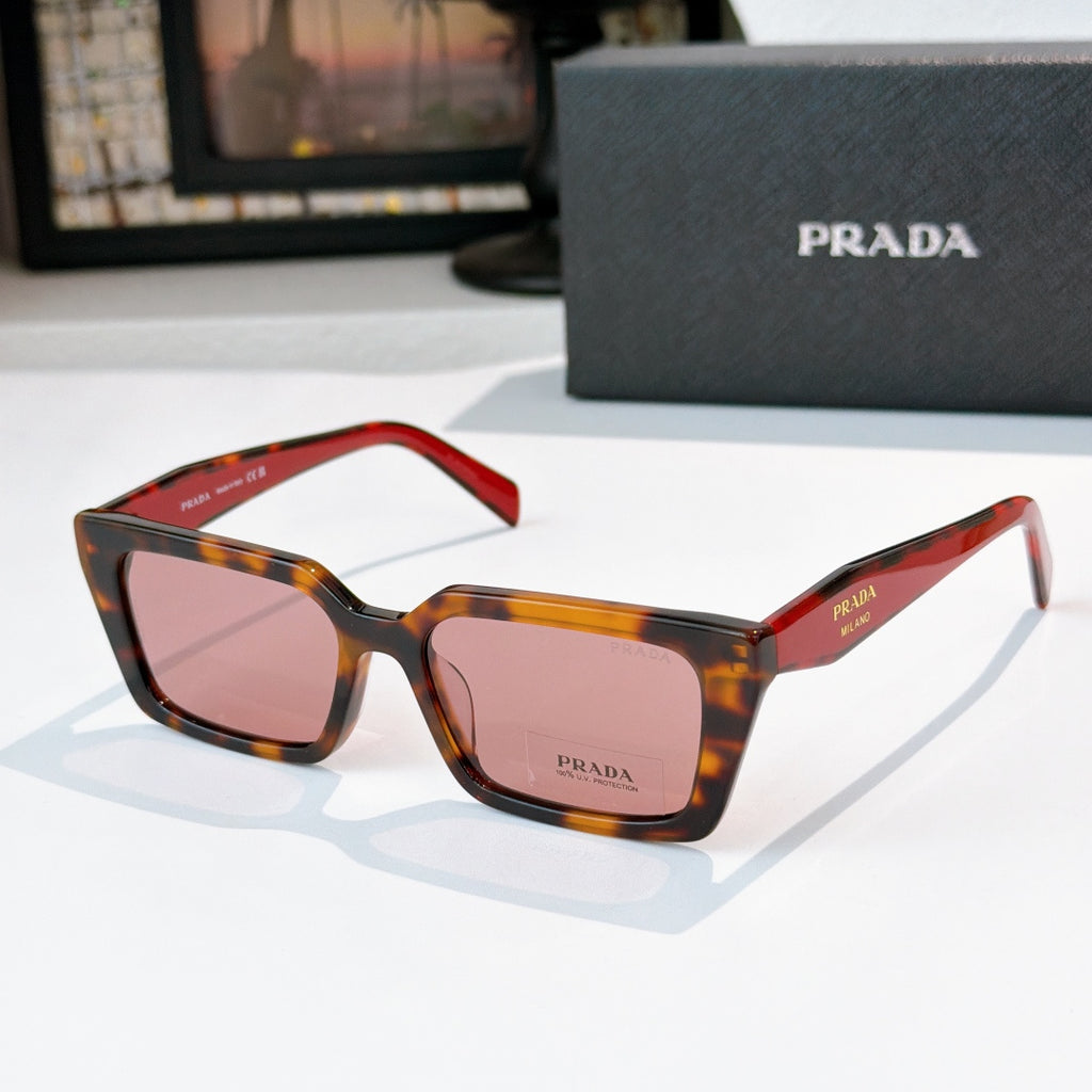 Tortoise and red square sunglasses with amber lenses and Prada logo on temple