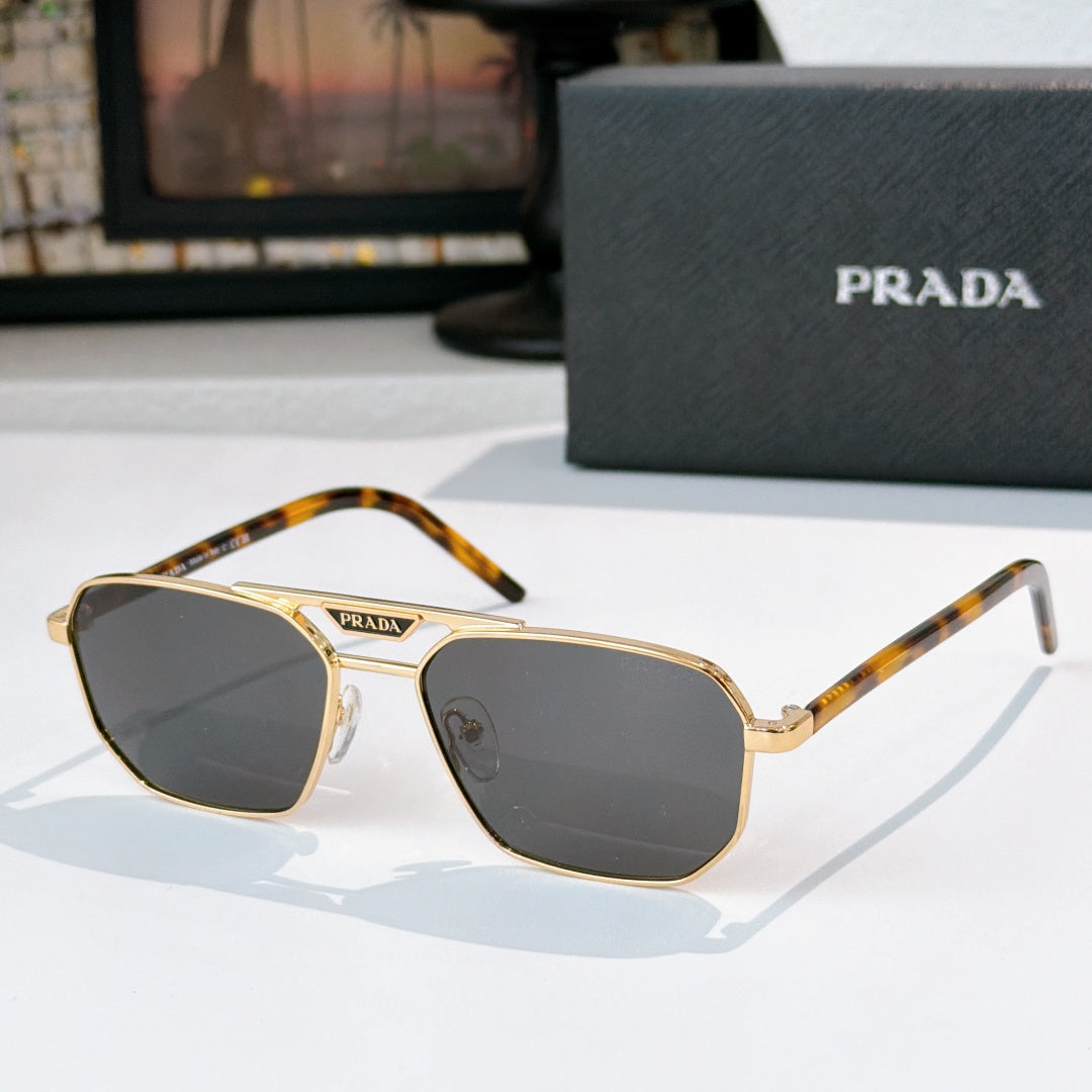 Prada eyeglasses with dark lenses and tortoiseshell temples, slim metal frame