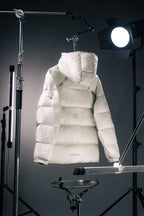 White hooded Moncler puffer jacket, back view with logo and hood