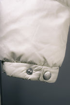 White Moncler puffer jacket cuff with snap button and elastic trim