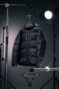 Long Moncler puffer jacket with hood, dark fabric, full-zip front