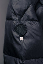 Moncler puffer jacket chest snap button and circular logo badge