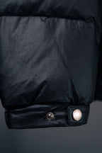 Moncler puffer jacket lower hem with snap button and ribbed cuff