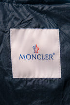 Moncler logo fabric label on puffer jacket, square white patch