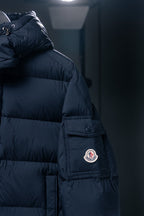Moncler long puffer jacket shoulder with logo patch and zipper pocket panel
