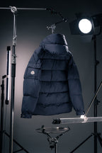 Moncler long puffer jacket with hood and dense quilted back panels