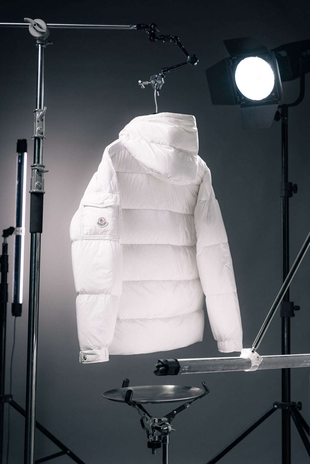 White hooded long puffer jacket back view with quilted baffle stitching