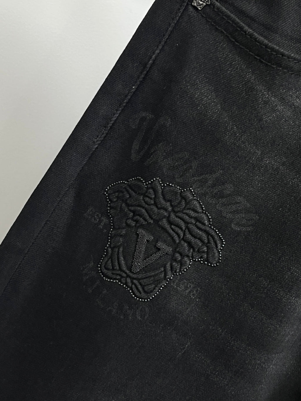 Black Versace jeans with embroidered side logo on the leg