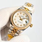 Two-tone wristwatch with white dial, gold markers, diamond bezel, and jubilee bracelet