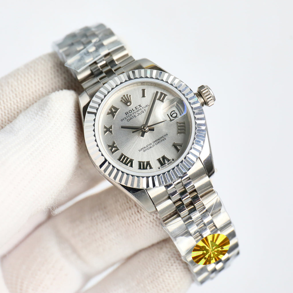 Wristwatch with silver dial, Roman numerals, and steel bracelet, crown on right