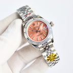 Wristwatch with orange dial, silver bezel, and steel bracelet, crown on right