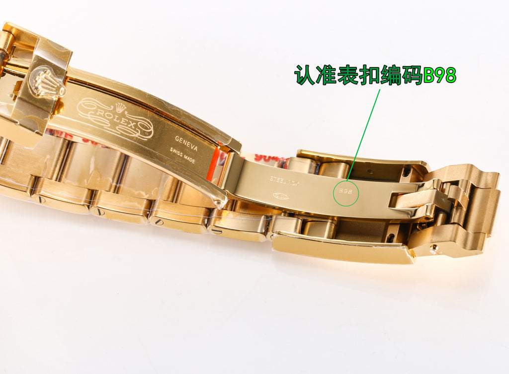 Gold Rolex bracelet with clasp and engraved text on links