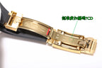 Rolex wristwatch bracelet with gold-tone links and black leather strap.