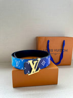 Blue logo-print belt with silver LV buckle, placed on dark leather backing