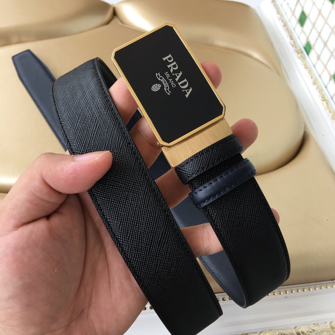 Prada belt with black textured strap and gold-toned rectangular logo buckle