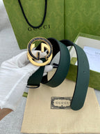 Gucci belt dark green strap with round GG logo buckle in gold and silver