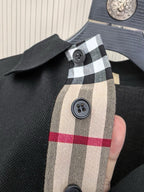 Burberry polo shirt detail, check inner placket and buttons on dark navy