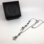 Silver chain necklace with fleur-de-lis and lock charms, with black gift box