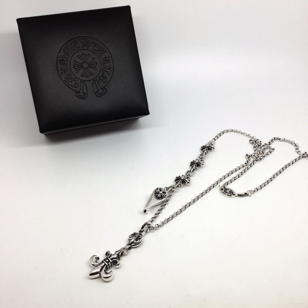 Silver chain necklace with fleur-de-lis and lock charms, with black gift box