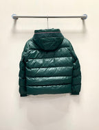 Moncler long puffer jacket, green back view with hood, on hanger