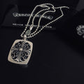 Silver square pendant necklace with filigree scroll design and bead chain