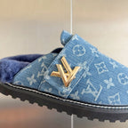 Louis Vuitton monogram sandal with blue patterned strap and gold V emblem