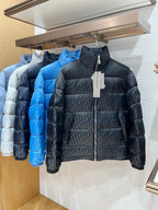 Dior long puffer jackets on display rack, dark and light blue tones, front zippers