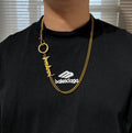 Balenciaga gold logo necklace with oval ring clasp and curb chain