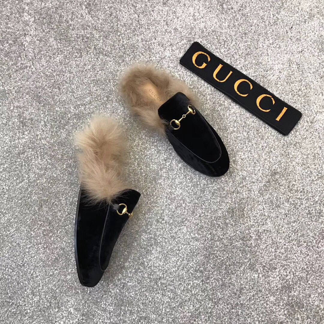 Black velvet loafer slides with beige faux fur trim and gold-tone ring clasp