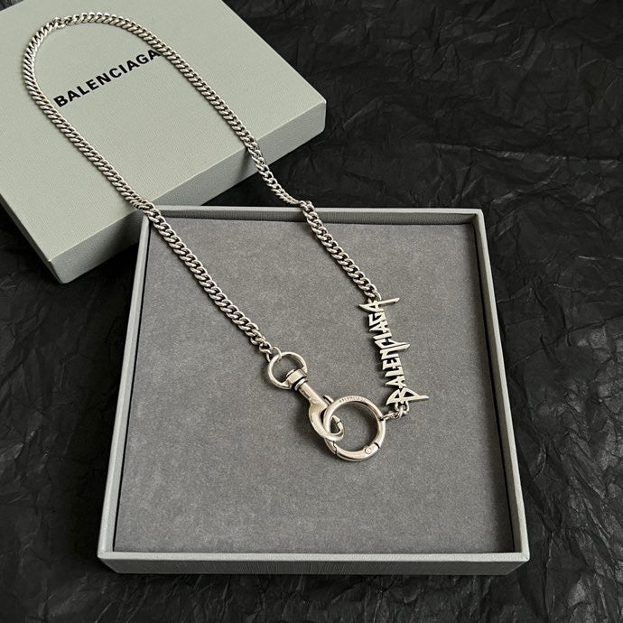 Balenciaga chain necklace with silver ring and logo charm in gift box