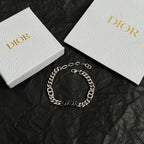 Silver-tone Dior chain bracelet with oval link charms and engraved DIOR bar