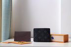 Louis Vuitton small bag, black monogram leather pouch with front flap