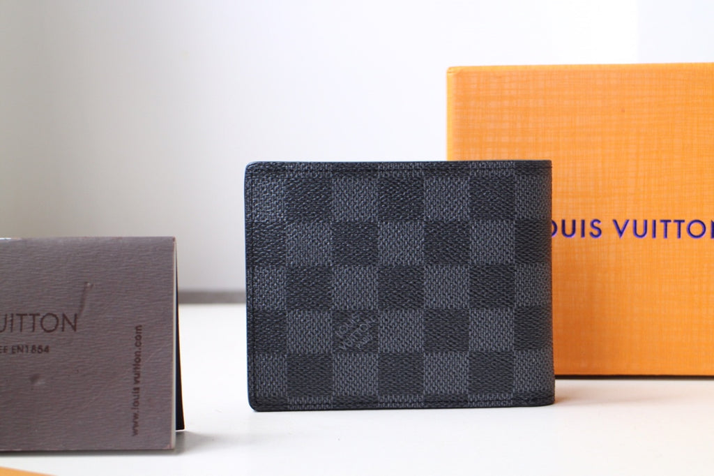 Dark checkered Louis Vuitton wallet, front view with logo mark