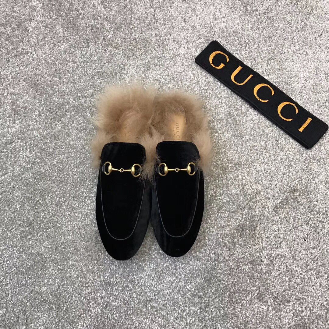 Black velvet loafer slide with beige faux fur trim and gold-tone ring hardware