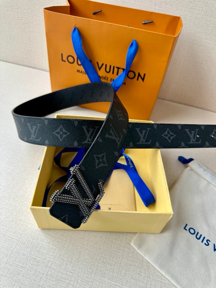Louis Vuitton belt in dark blue monogram with LV rhinestone buckle and leather holes