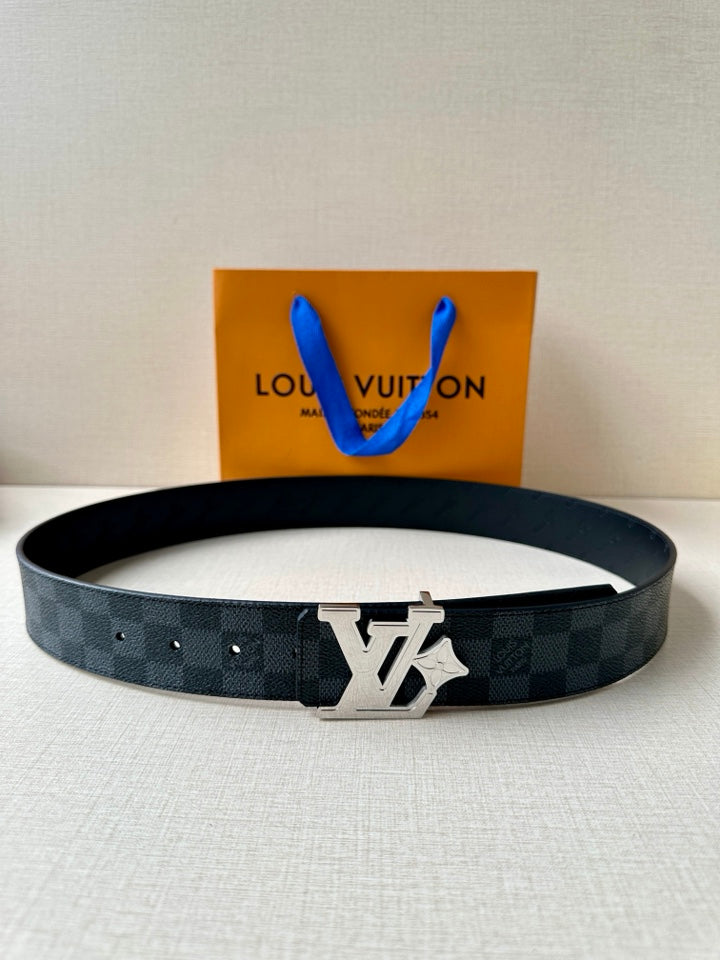 Dark leather belt with LV logo buckle, paired with a gift bag and pouch.