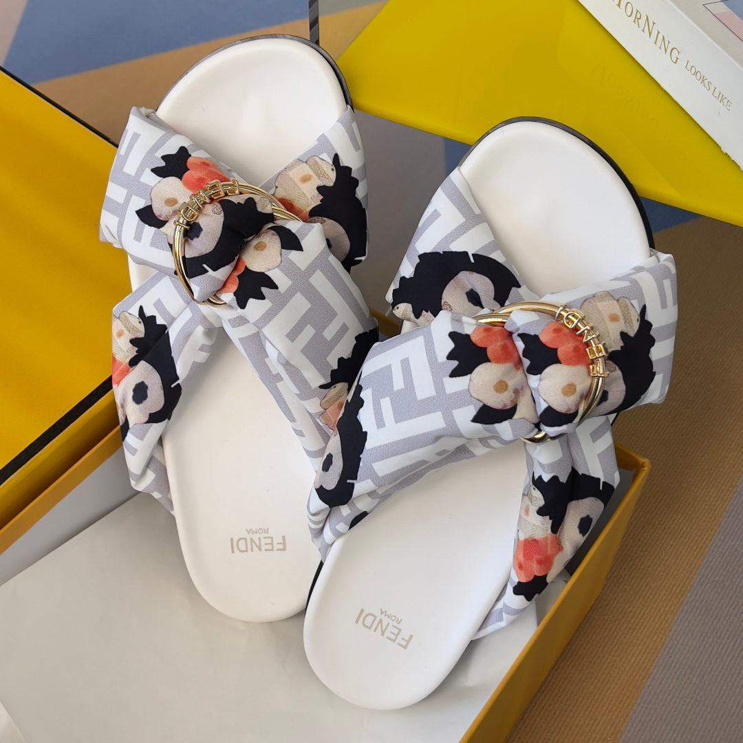 Fendi sandals in box, white slides with floral Fendi FF pattern and gold buckle charm