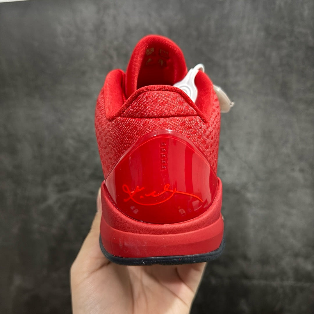 Red basketball shoe heel view with molded details and cushioned collar