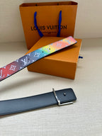 Navy leather belt with silver rectangular buckle and punched holes