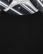 Black crewneck long top with ribbed neckline