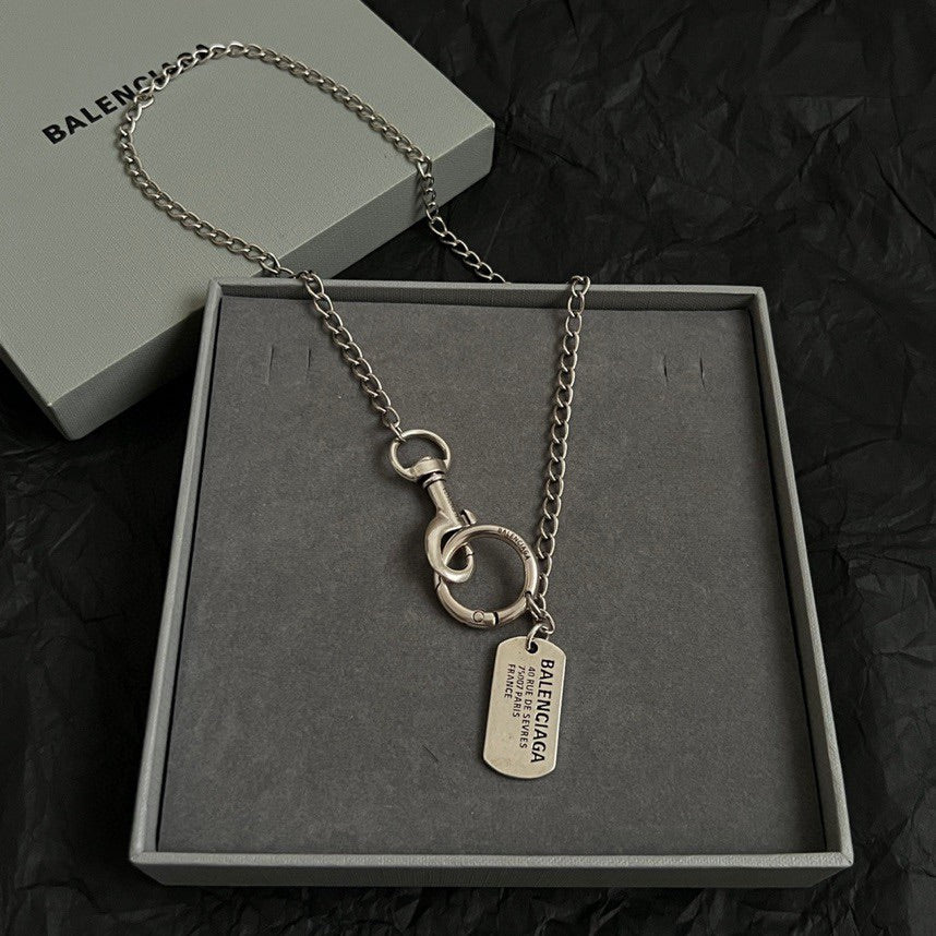 Balenciaga keychain necklace in gift box with metal chain, rings, and dog tag