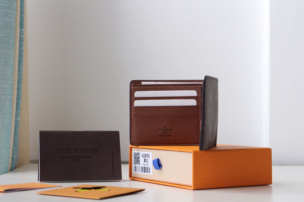 Louis Vuitton small bag wallet, brown leather with card slots