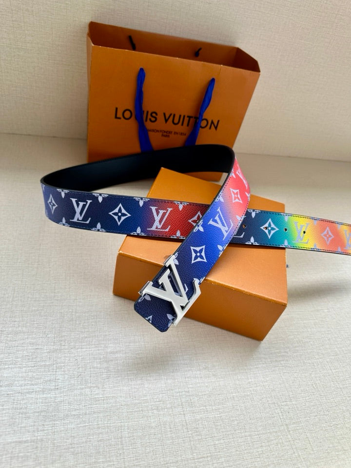 Logo-print belt with multicolor motifs and silver buckle, folded and displayed