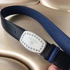 Navy fabric belt with rectangular silver studded Prada buckle
