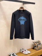 Navy Versace sweatshirt with blue mosaic logo on chest