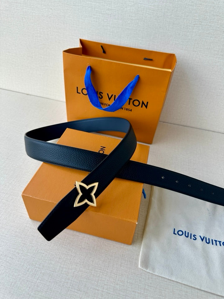 Louis Vuitton leather belt with dark blue strap and star-shaped buckle